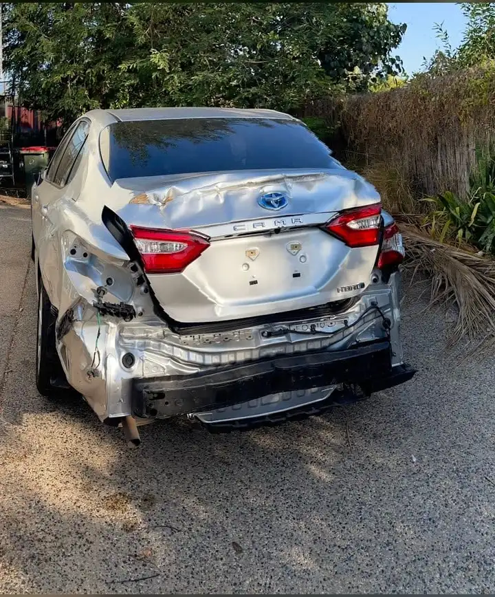 Silver Toyota Camry with extensive rear collision damage before body repairs in Darwin
