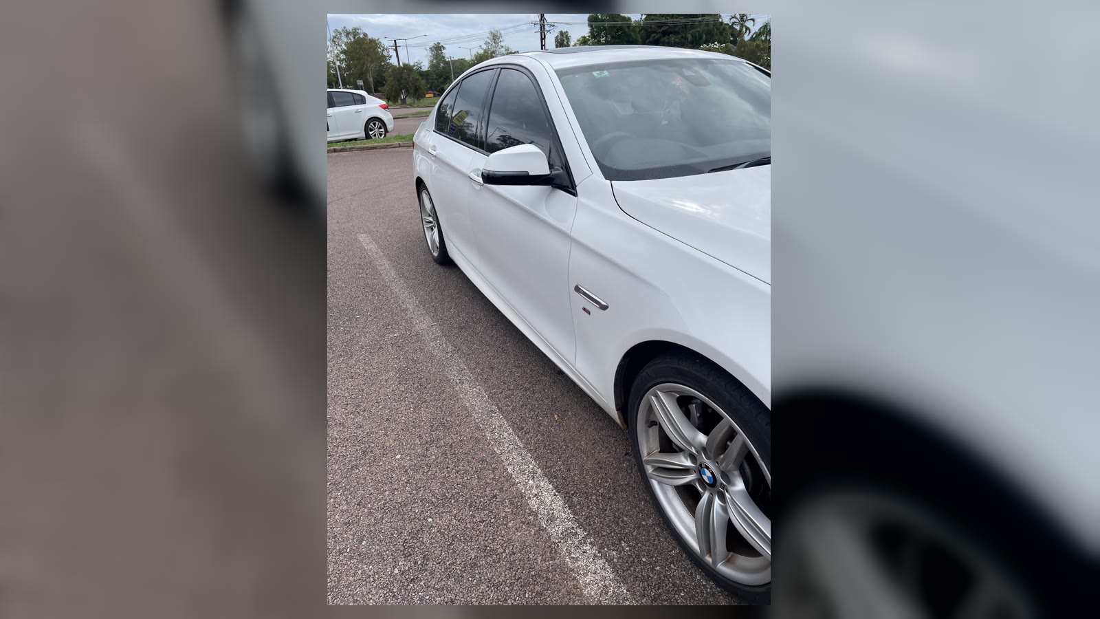Glossy white BMW after cut and polish paint correction at Auto Body Fix Darwin
